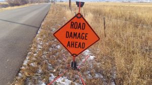 Road Damage Ahead sign