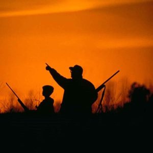 1200px-Silhouette_of_father_and_son_hunting_in_the_sunset-1024x669.jpg