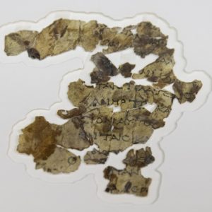 The Israel Antiquities Authority displays newly discovered Dead Sea Scroll fragments at the Dead Sea scrolls conservation lab in Jerusalem, Tuesday, March 16, 2021. Israeli archaeologists on Tuesday announced the discovery of dozens of new Dead Sea Scroll fragments bearing a biblical text found in a desert cave and believed hidden during a Jewish revolt against Rome nearly 1,900 years ago. (AP Photo/Sebastian Scheiner)