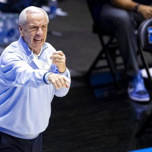 North Carolina head coach Roy Williams directs players during the second half of a first-round game against Wisconsin in the NCAA men's college basketball tournament, Friday, March 19, 2021, at Mackey Arena in West Lafayette, Ind. (AP Photo/Robert Franklin)