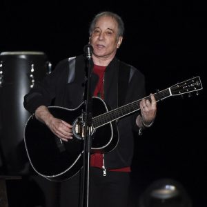 FILE - Paul Simon performs during the final stop of his Homeward Bound - The Farewell Tour concert on Sept. 22, 2018, in New York. Sony Music Publishing announced Wednesday, March. 31, 2021, that it has acquired Simon's catalog, which includes six decades of music, from his time in Simon & Garfunkel to his solo career. Financial details of the deal were not announced. (Photo by Evan Agostini/Invision/AP, File)