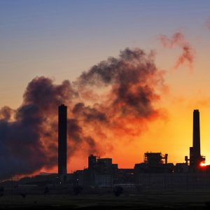 FILE - In this July 27, 2018, file photo, the Dave Johnson coal-fired power plant is silhouetted against the morning sun in Glenrock, Wyo. A law signed April 6, 2021, by Republican Gov. Mark Gordon creates a $1.2 million fund for an initiative that marks the latest attempt by state leaders to help coal in the state that accounts for the bulk of U.S. coal production, which is down by half since 2008. Wyoming coal production, which accounts for about 40% of the nation's total, has declined as utilities switch to gas, which is cheaper to burn to generate electricity. Solar and wind power also are on the rise as coal's share of the U.S. power market shrinks from about half in the early 2000s to less than 20% now. (AP Photo/J. David Ake, File)