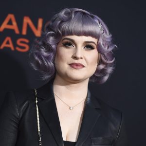 FILE - Kelly Osbourne arrives at the Los Angeles premiere of "Angel Has Fallen" on Aug. 20, 2019. Osbourne will discuss her battle with drugs and alcohol addiction on the Facebook Watch series "Red Table Talk" on Wednesday, June 2. (Photo by Jordan Strauss/Invision/AP, File)
