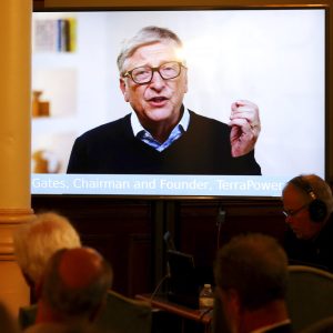 TerraPower Founder and Chairman Bill Gates speaks to the crowd in a recorded video message during the press conference Wyoming Capitol, Wednesday, June 2, 2021, in Cheyenne, Wyo., announcing efforts to advance a Natrium reactor demonstration project. "We think Natrium will be a game-changer for the energy industry," Gates said by video link to a news conference hosted by Gov. Mark Gordon. "Wyoming has been a leader in energy for over the century and we hope our investment in Natrium will help Wyoming to stay in the lead for many decades to come." (Michael Cummo/The Wyoming Tribune Eagle via AP)