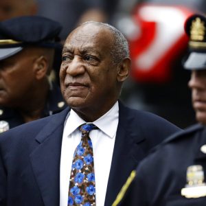 FILE - In this Sept. 24, 2018 file photo, Bill Cosby arrives for his sentencing hearing at the Montgomery County Courthouse, in Norristown, Pa. Pennsylvania’s highest court has overturned comedian Bill Cosby’s sex assault conviction. The court said Wednesday that they found an agreement with a previous prosecutor prevented him from being charged in the case. (AP Photo/Matt Slocum, File)