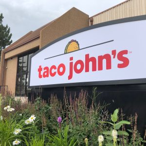 A sign stands outside the corporate headquarters of Cheyenne-based Taco John's, Aug. 1, 2019, in Cheyenne, Wyo. Taco Bell rang up a win Tuesday, July 18, 2023, in its quest to make “Taco Tuesday" free of trademark restrictions, with Taco John’s formally abandoning its decades-old claim to own the phrase amid a challenge from its bigger rival. (AP Photo/Mead Gruver, File)