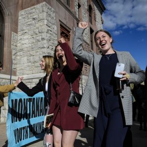 FILE - Youth plaintiffs in the climate change lawsuit, Held vs. Montana, arrive at the Lewis and Clark County Courthouse, on June 20, 2023, in Helena, Mont., for the final day of the trial. A Montana judge on Monday, Aug. 14, sided with young environmental activists who said state agencies were violating their constitutional right to a clean and healthful environment by permitting fossil fuel development without considering its effect on the climate. (Thom Bridge/Independent Record via AP, File)