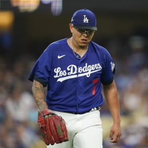 Los Angeles Dodgers starting pitcher Julio Urias heads to the dugout after the top of the fifth inning of the second baseball game of the team's doubleheader against the Miami Marlins, Saturday, Aug. 19, 2023, in Los Angeles. (AP Photo/Ryan Sun)