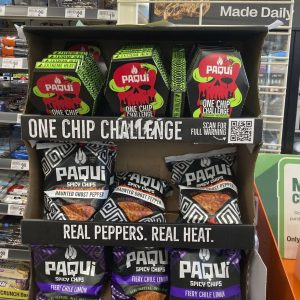 Paqui One Chip Challenge chips are displayed at a 7-Eleven store in Boston, Thursday, Sept. 7, 2023. The death of a Massachusetts teenager after his family said he ate an extremely spicy tortilla chip has led to an outpouring of concern about the social media challenge and prompted retailers to pull the product from their shelves at the manufacturer's request. The chips were removed from display on Friday, Sept. 8.  (AP Photo/Steve LeBlanc)
