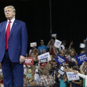 Former President Donald Trump stands as the crowd cheers at the South Dakota Republican Party Monumental Leaders rally Friday, Sept. 8, 2023, in Rapid City, S.D. (AP Photo/Toby Brusseau)