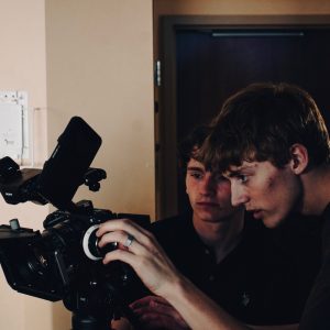 CHS alumnus Jarom Beardall makes camera adjustments during the filming of his short film "The Light That Remains."  A free admission showing of the film will be held at Big Horn Cinemas at 7 p.m. on June 1.