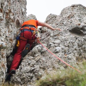 low-angle-shot-male-that-is-rope-climbing-rocky-cliff-1024x683.jpg